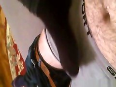 Hottie in black nylons rubbing a dick through the boxers