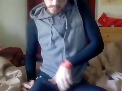 handsome lust pink guy caressing his cock through tightspandex