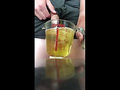desperate to pee and empty in a jar