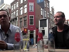 Dutch prostitute sucks tourist at red lights