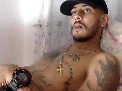 handsome tattoed smooth fit guy jerking his big uncut cock