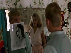 Kelly Preston removing her bra to reveal her nice breasts,