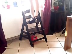 Girl Putting Her White Tights youthful aunt each On After Bandaging Sprained Ankle