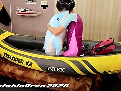 humping plush stuffed dolphin in inflatable kayak