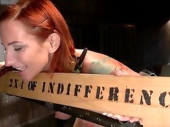 Redhead is strapped in device bondage