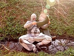 sweatpants soaking in mud, pissing in wellies
