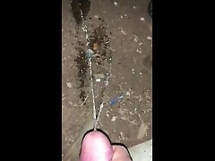 sitting outside taking a piss in public!