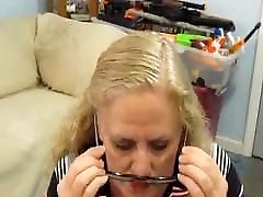 Dropping a load on her glasses