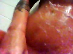 Ivy lathering up those big tits and pussy in shower...