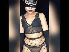 Katwoman undressing for you