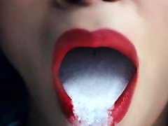 Ebony mouth full of nut