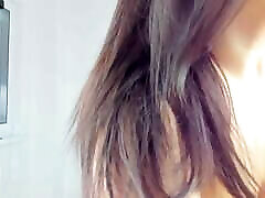 Woman with gorgeous natural breasts shows herself and cares