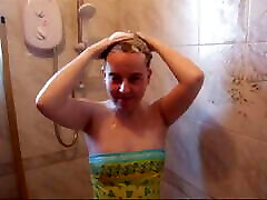 Washing hair in swimsuit