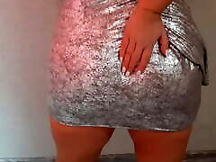Girl in silver dress touching big ass