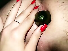 Mistress fucks guy’s ass with a big cucumber