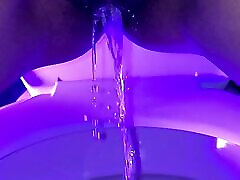 babe peeing in slow-mo – rainbow