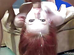 Green eyed redhead deepthroats a massive cock until he cums