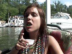 Party girls show off all the beads they got from tit flashing