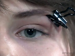 Brunette white girl clipped and pinned with paper clips and chained to the pole