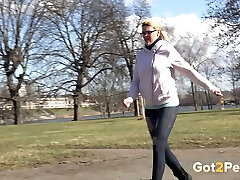 Nerdy white blonde chick in glasses pisses on the street