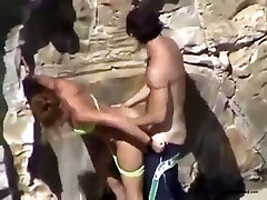 Horny girlfriend seduced her man for a quickie behind the rock