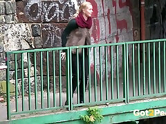 Dirty-minded auburn chick is caught on cam pissing outdoors in various places