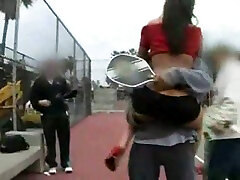 My shameless brunette bitch exposes her goodies on tennis court