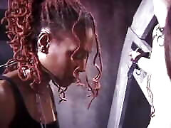 Black and white mistress dominate slave in dungeon