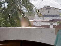 My wife show her tits on balcony for workers see