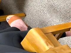 Feet soles arches of unaware worker