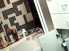 Spying on stepmom playing in front of the sink