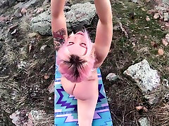 Girl Does Yoga On Mountain Top Overlooking Town Booty Closeups