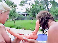 Two naughty German babes having hind video and video fun in the backyard